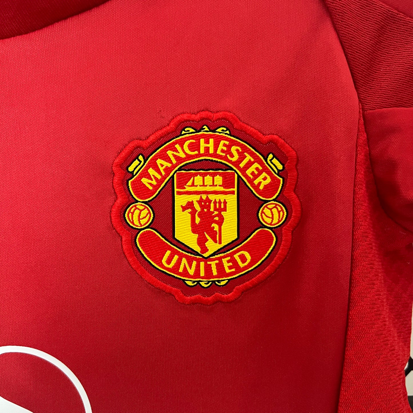 Kit Criança - Manchester United Principal 2024/25